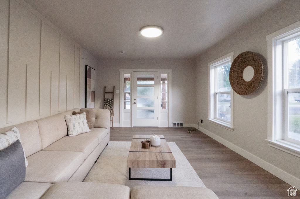 Living area featuring wood finished floors and baseboards