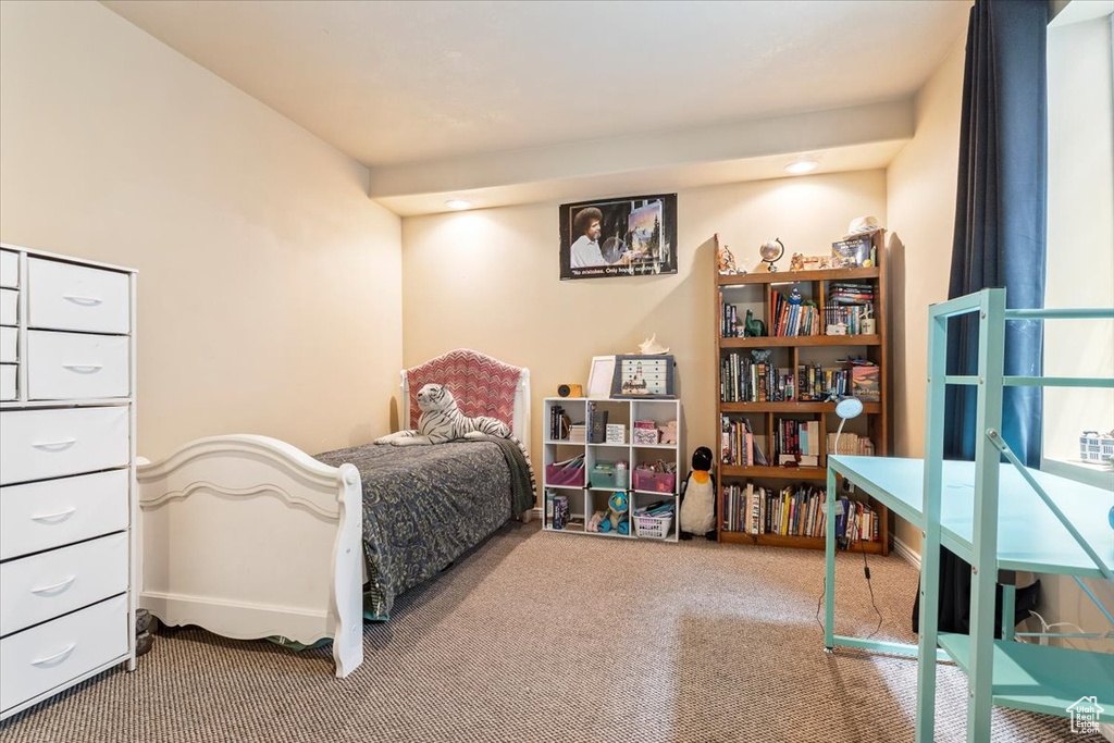 Bedroom featuring carpet flooring