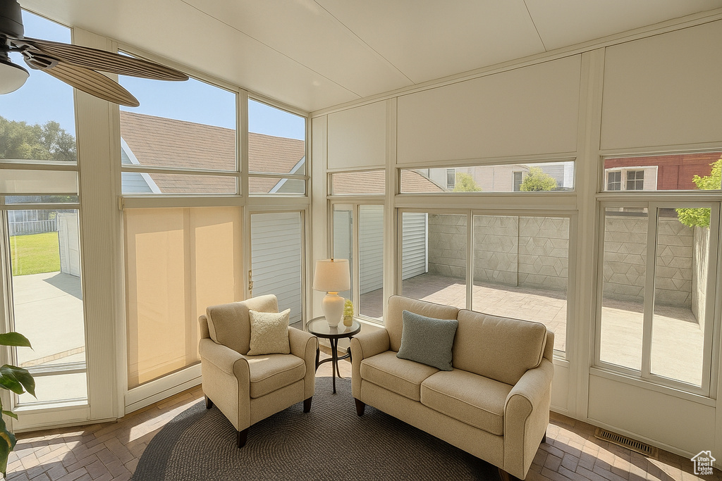Sunroom with brick patterned flooring