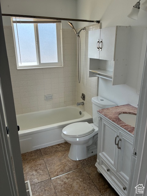 Full bathroom featuring vanity and shower / bathtub combination