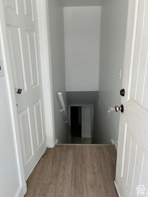 Stairway with wood finished floors