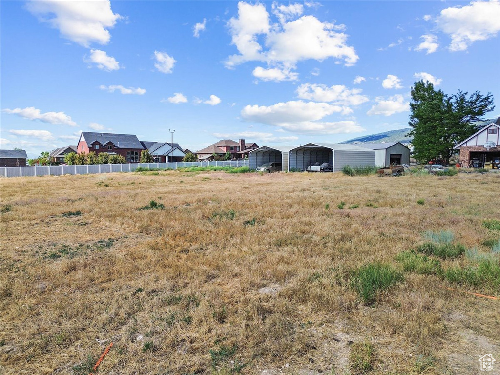 View of yard featuring a carport