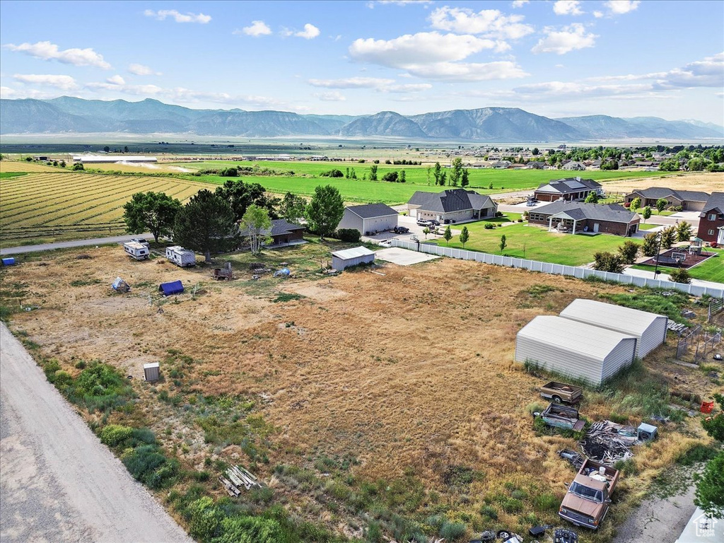View of mountain background featuring rural landscape