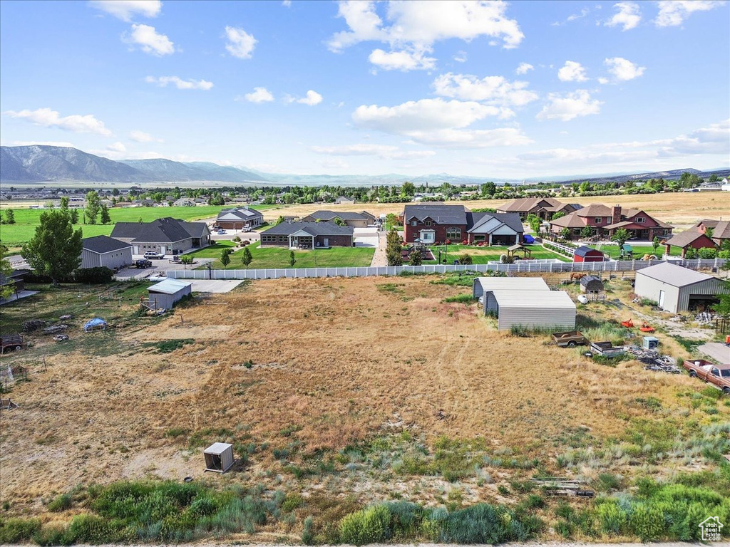 Aerial view of residential area with mountains