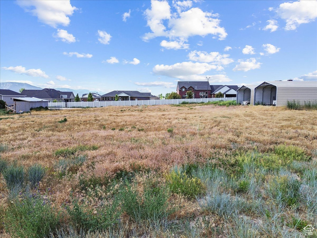 View of yard featuring a carport
