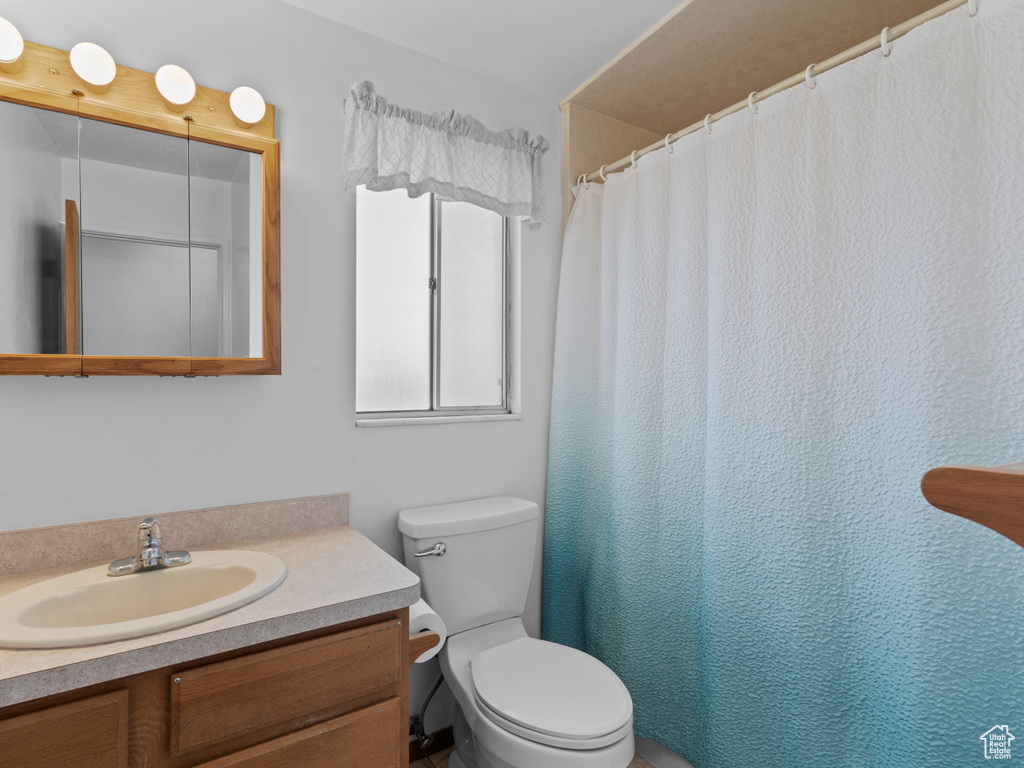 Bathroom with vanity and toilet