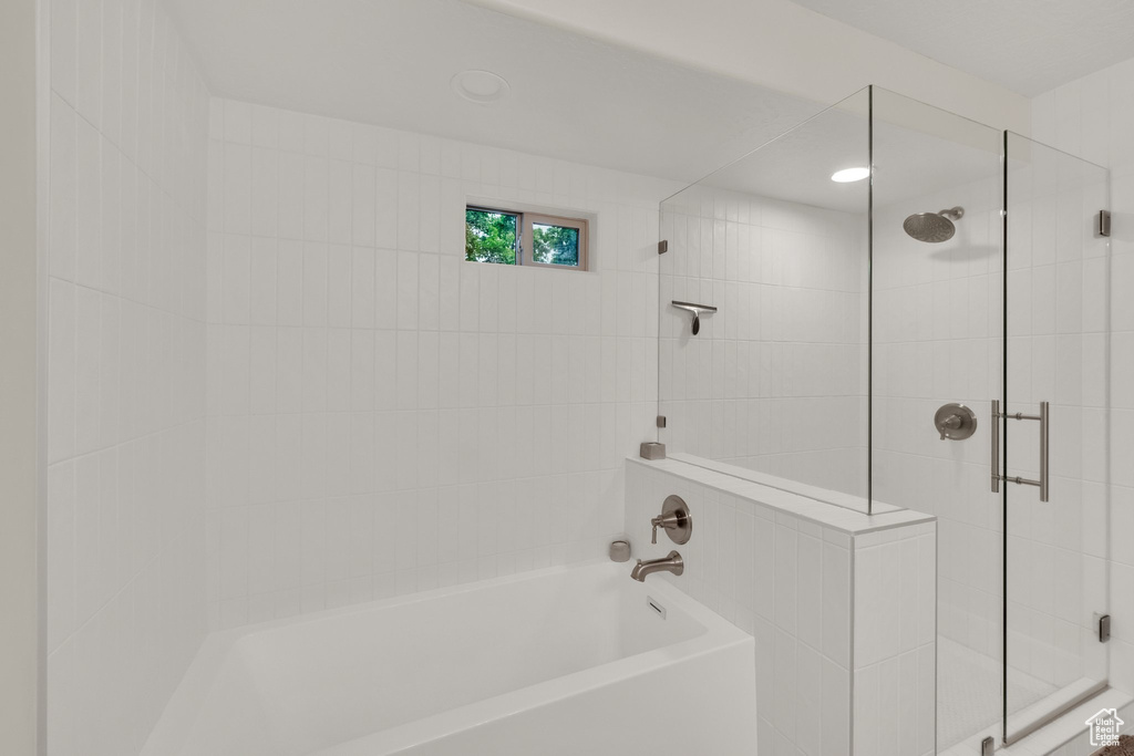Full bathroom featuring recessed lighting