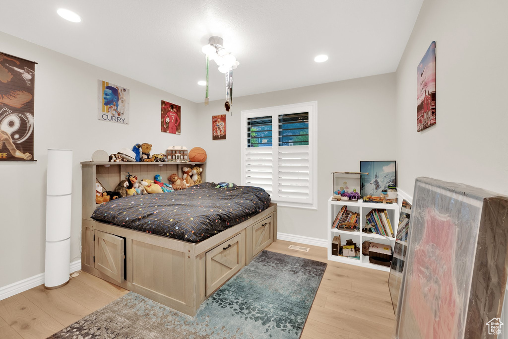 Bedroom featuring light wood-type flooring and recessed lighting