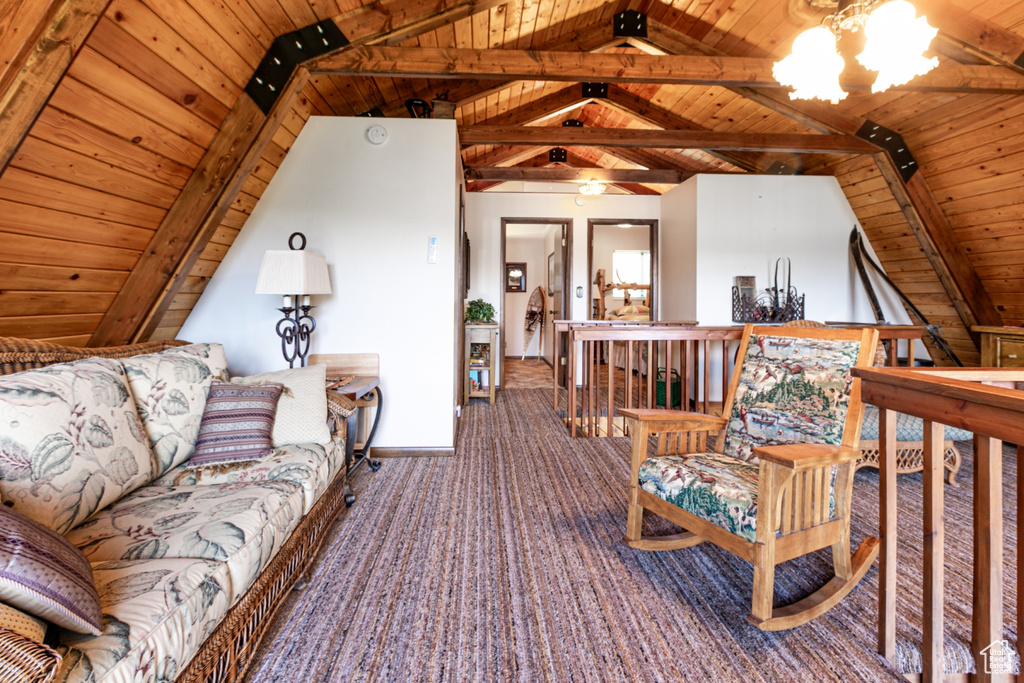 Living area with wood ceiling and carpet floors