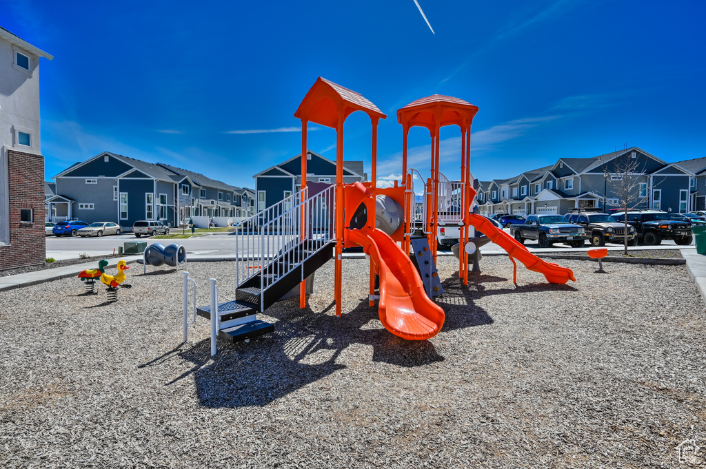 Communal playground featuring a residential view