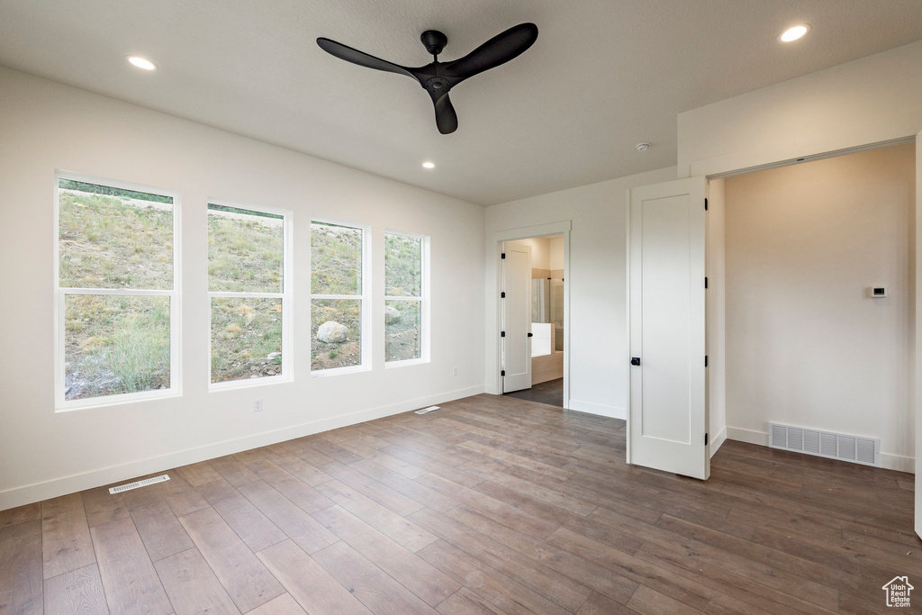 Unfurnished bedroom with wood finished floors, recessed lighting, and a ceiling fan