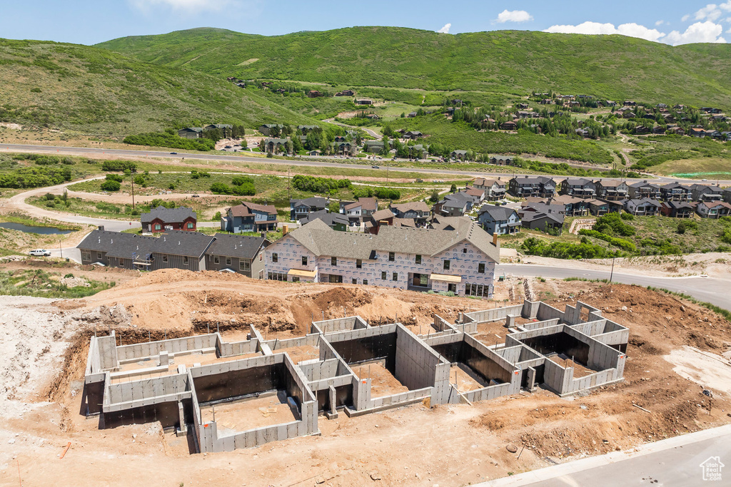 Aerial view of residential area with a mountain backdrop