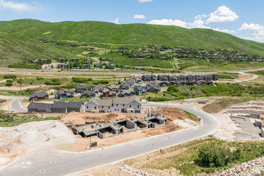 Aerial perspective of suburban area with a mountain backdrop