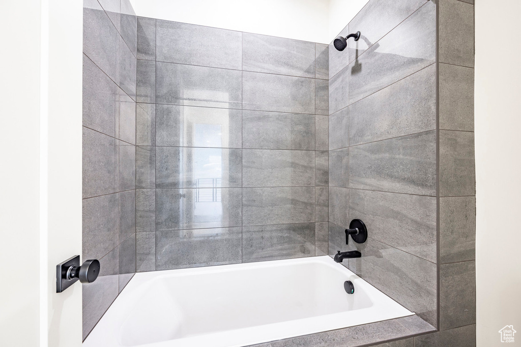 Bathroom featuring bathtub / shower combination