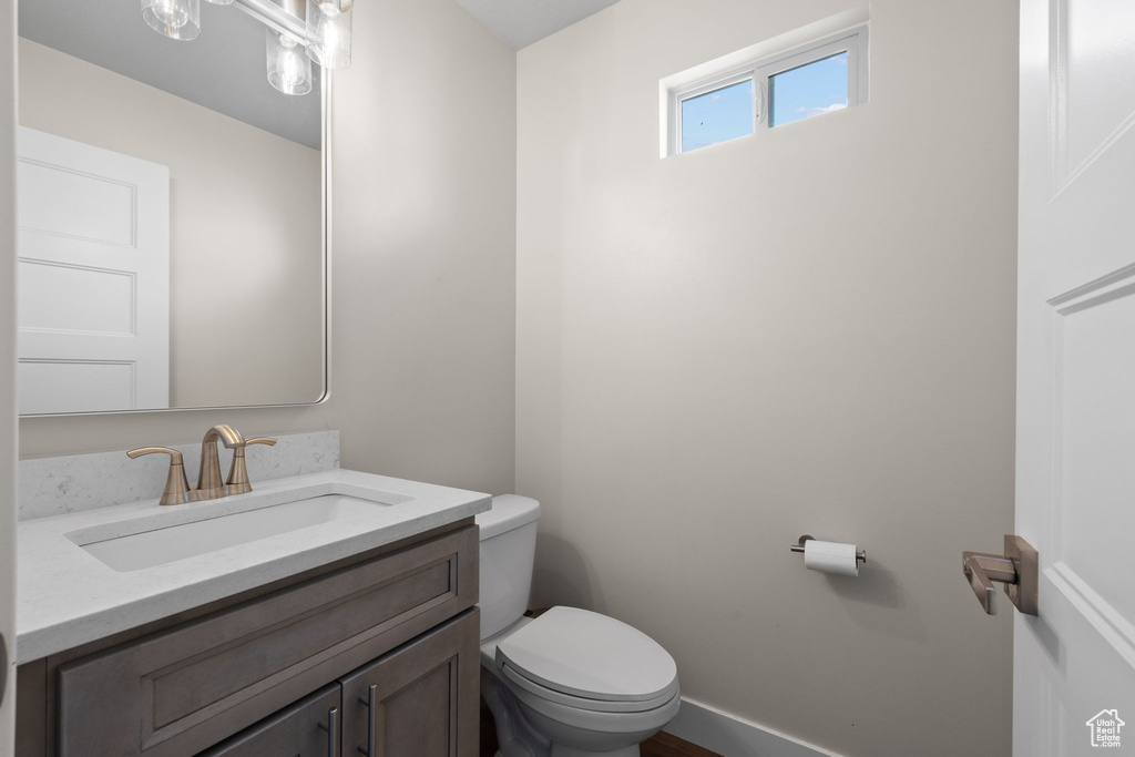 Bathroom with toilet and vanity