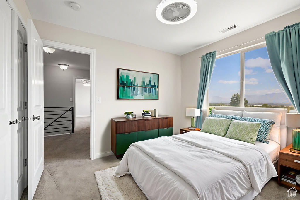 Bedroom with carpet and baseboards