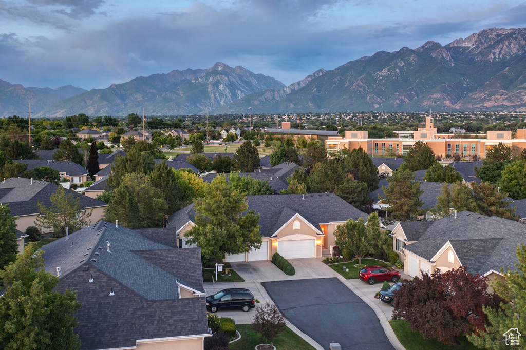 Aerial view of residential area with a mountain backdrop