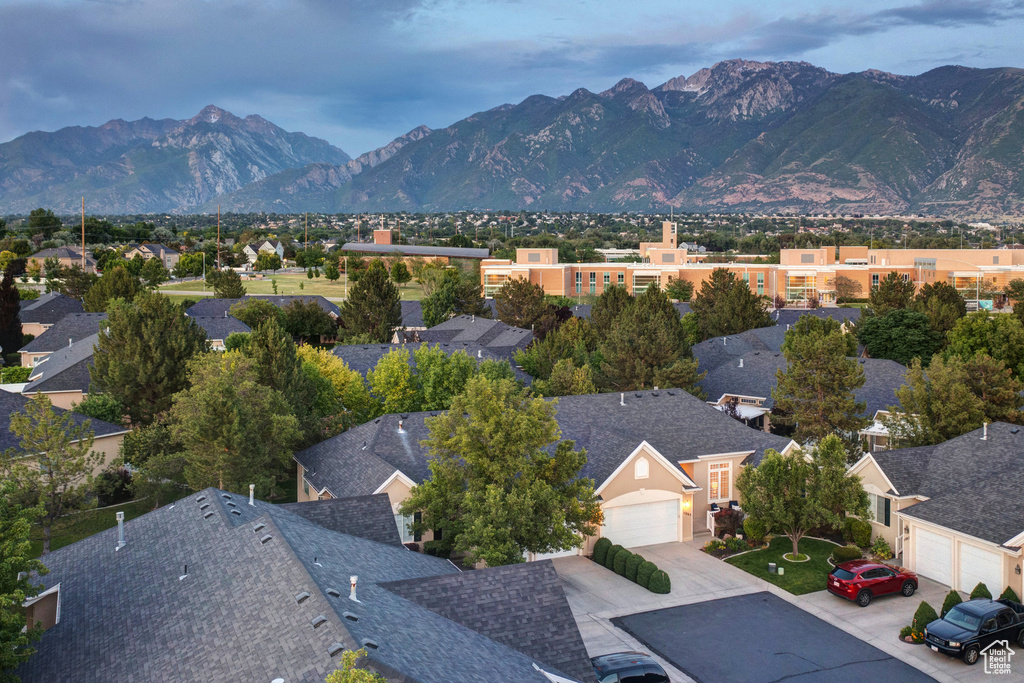 View of mountain background featuring nearby suburban area
