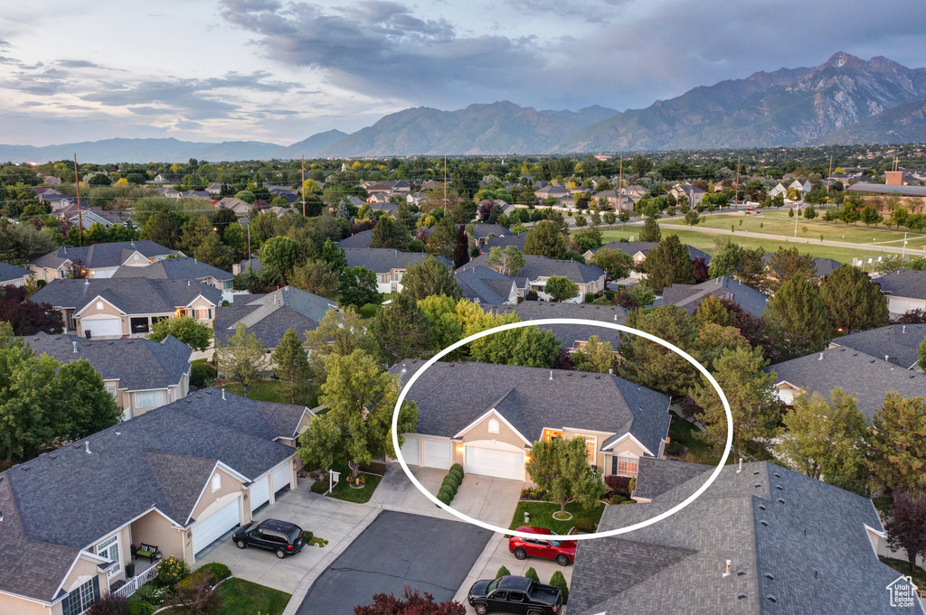 Aerial view of residential area with a mountainous background