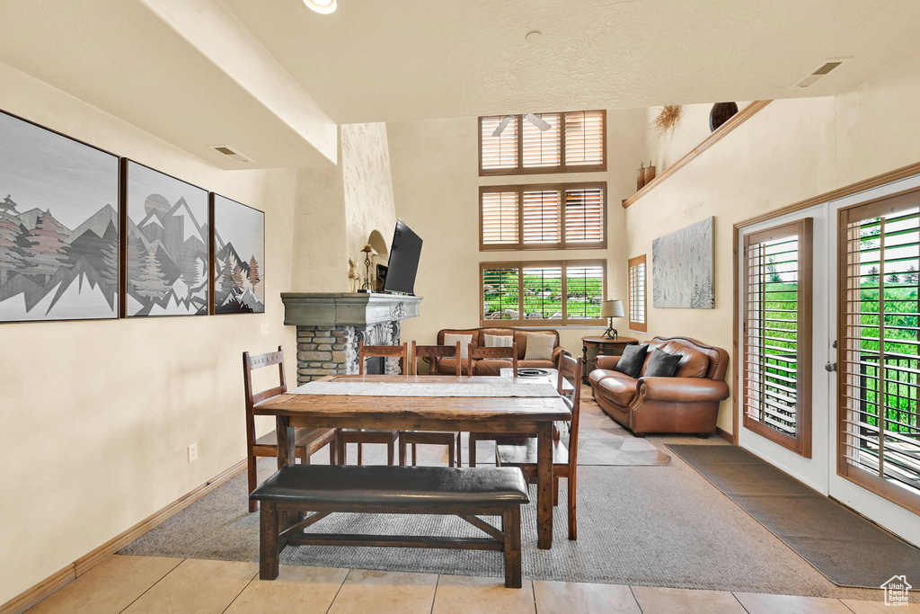 Carpeted dining room featuring tile patterned floors