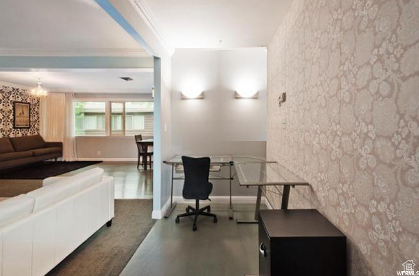 Office featuring a chandelier