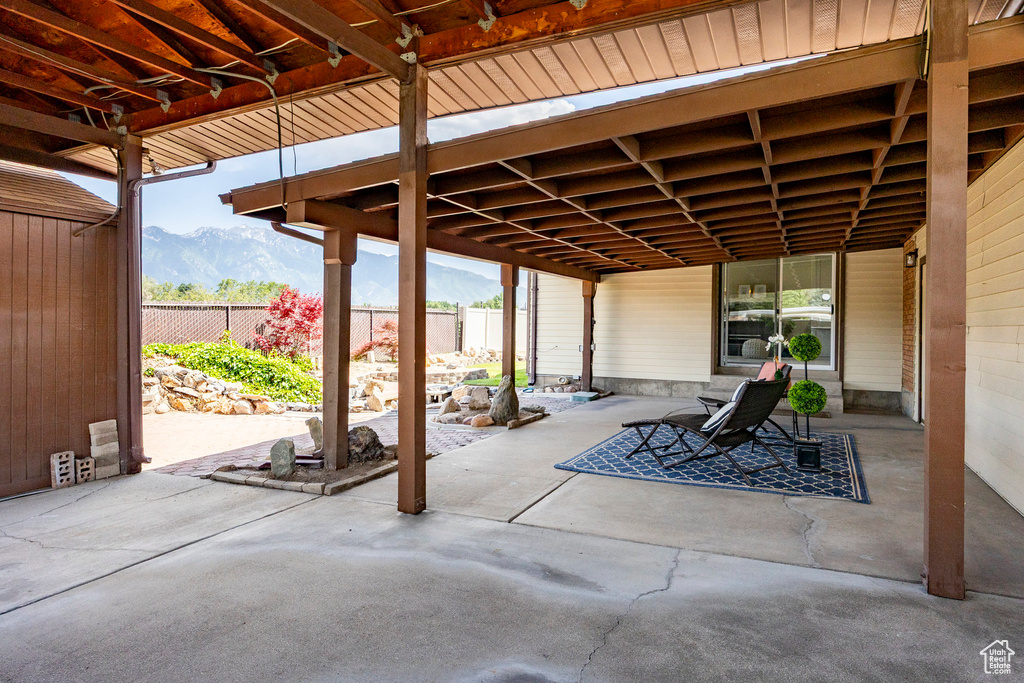 View of patio with a mountain view