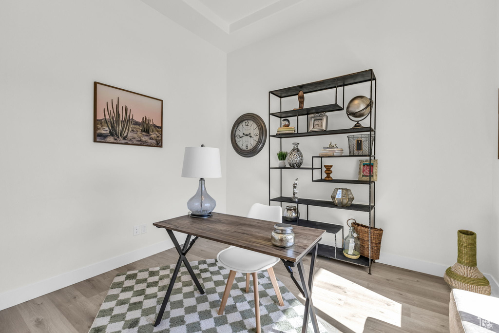 Home office featuring wood finished floors