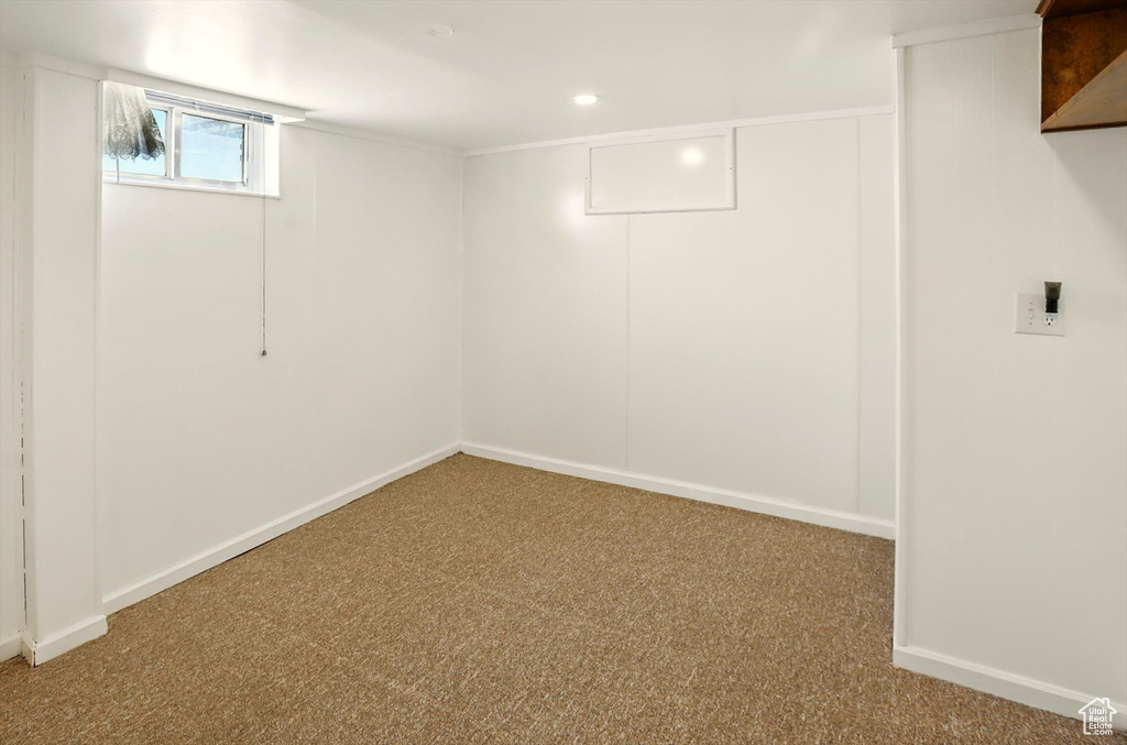 Basement featuring carpet flooring and recessed lighting