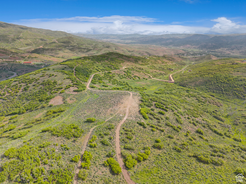 Aerial view of property's location with mountains