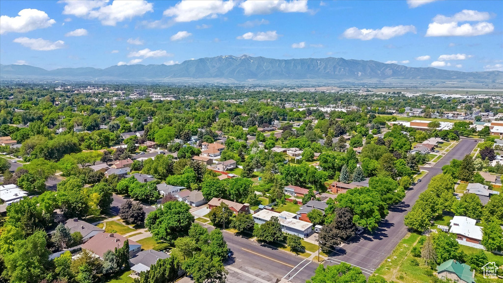 Aerial view of residential area featuring mountains