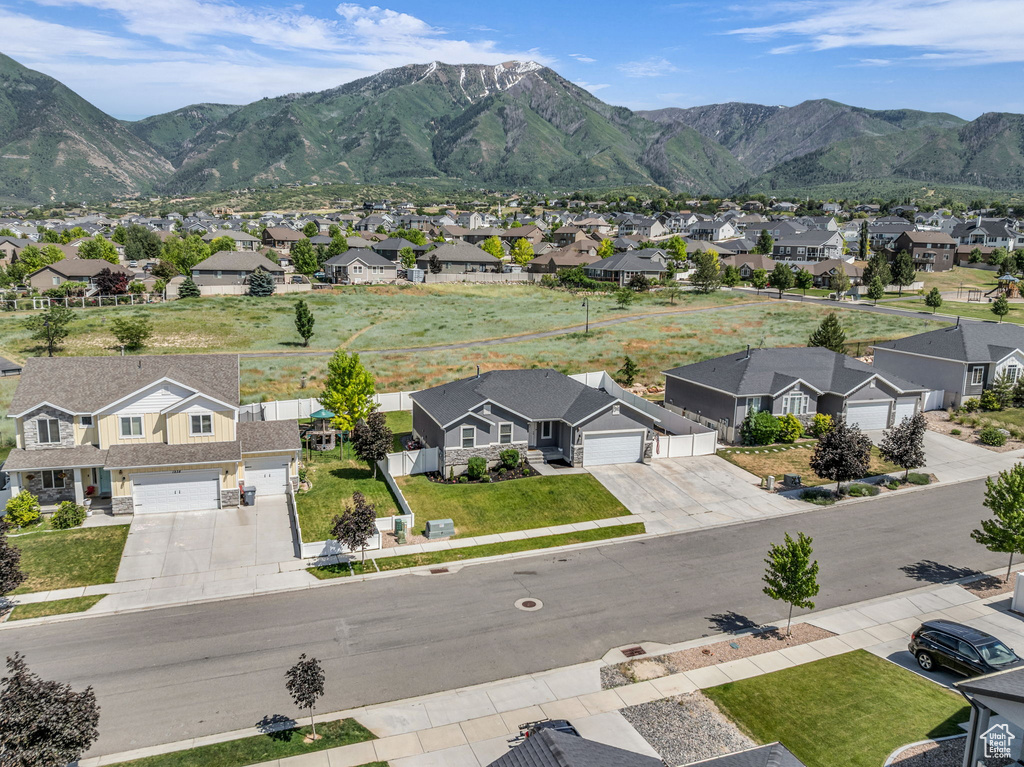 View of mountain background featuring nearby suburban area