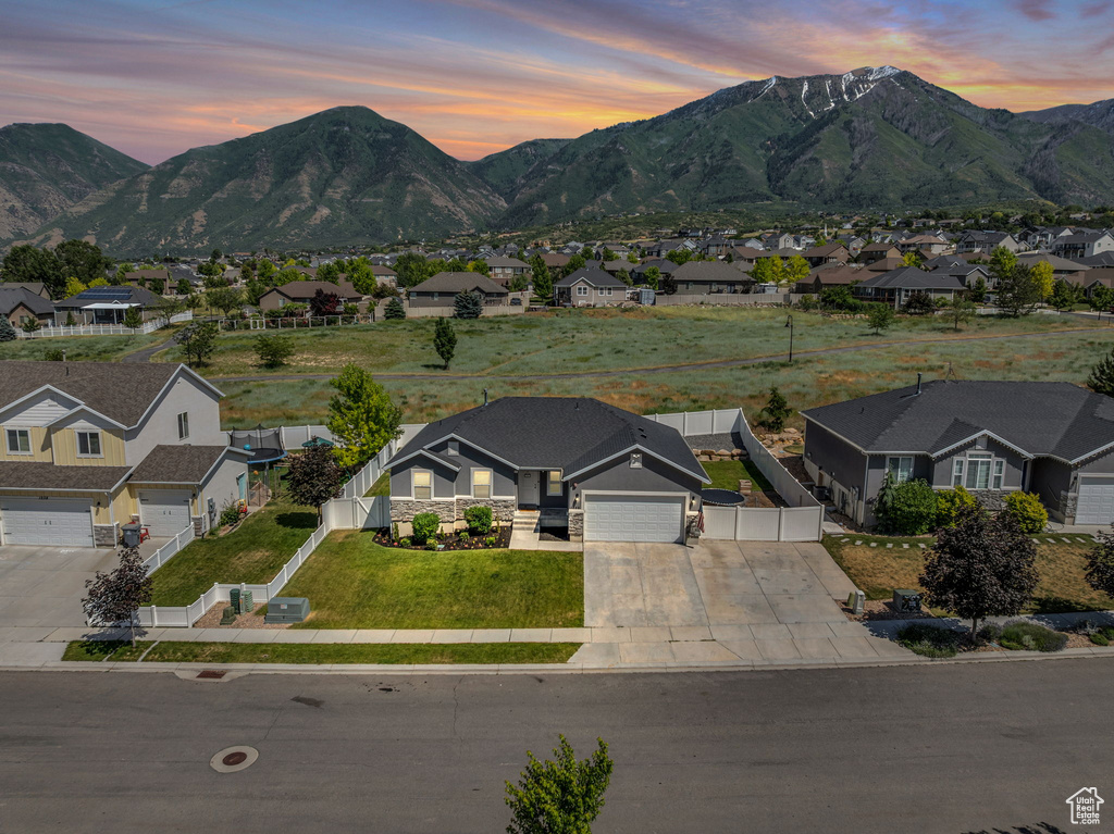 View of mountain backdrop with nearby suburban area