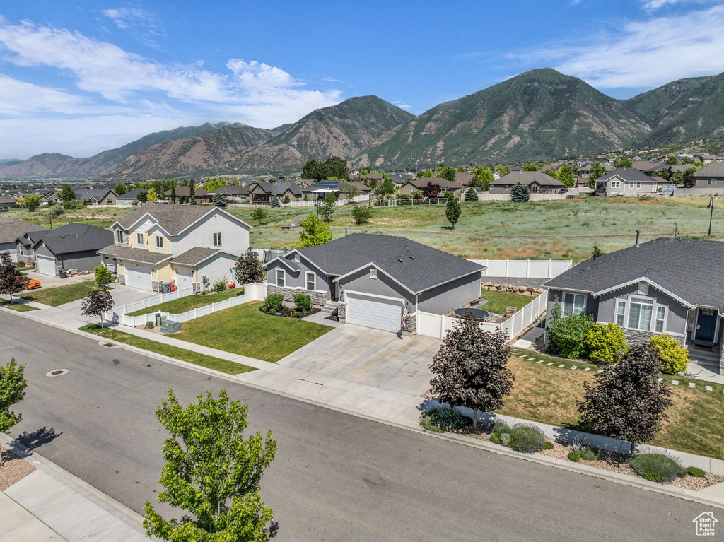 View of mountain backdrop with nearby suburban area