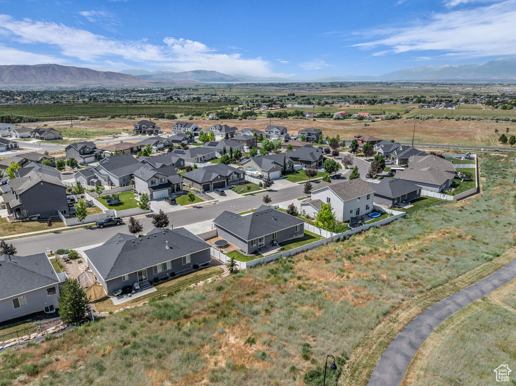 Aerial view of residential area featuring mountains