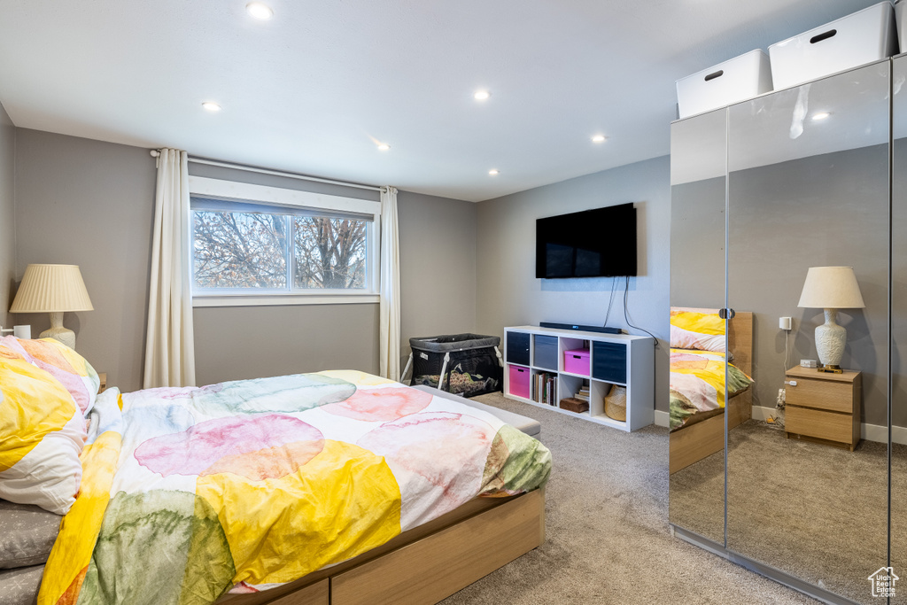 Bedroom with carpet flooring and recessed lighting