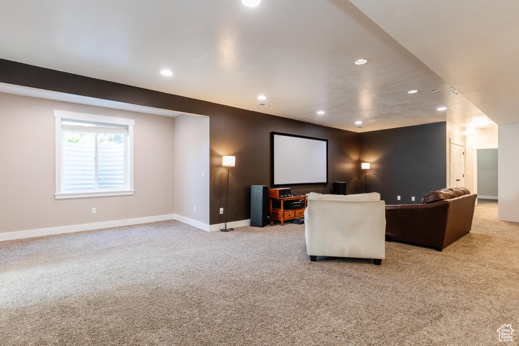 Cinema with light carpet and recessed lighting