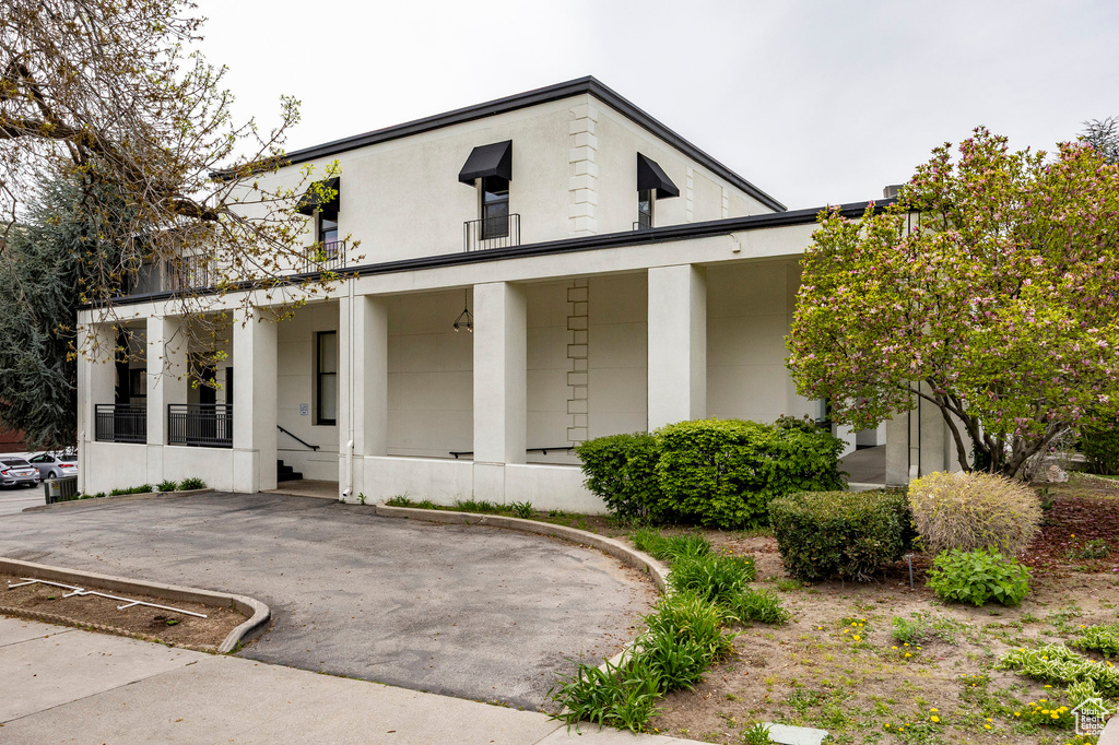 View of front of home featuring stucco siding