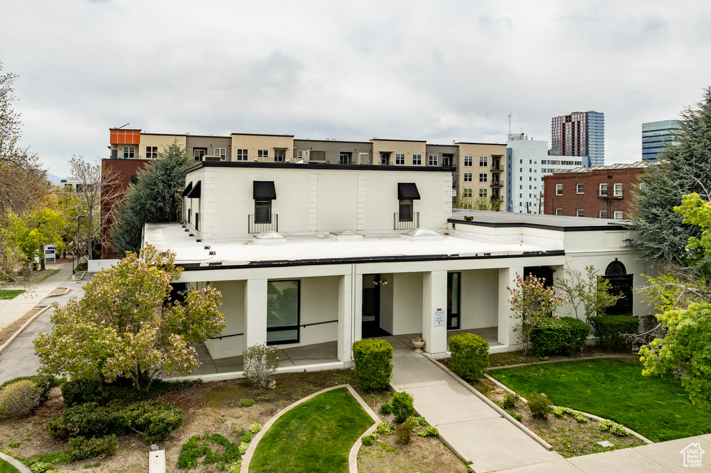 View of front of property with stucco siding