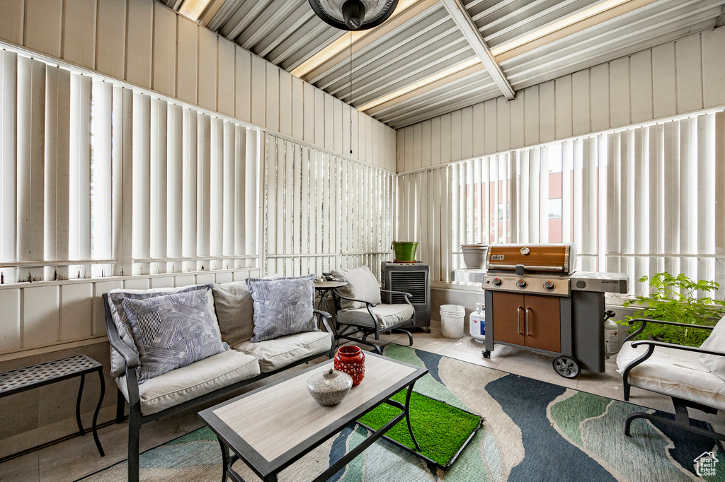 Sunroom featuring an outdoor living space