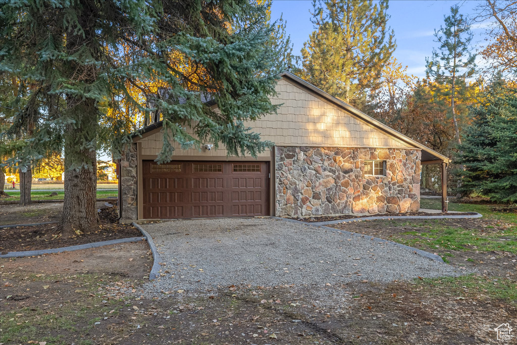 Garage featuring driveway
