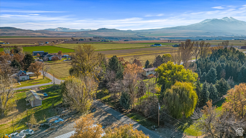 View of mountain backdrop featuring rural landscape