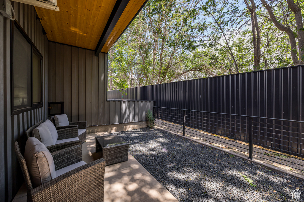 Fenced backyard with a patio area