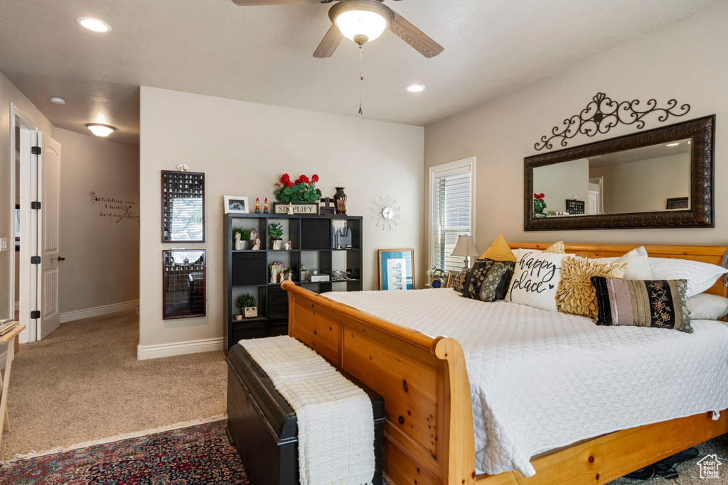 Bedroom with carpet flooring, recessed lighting, and a ceiling fan