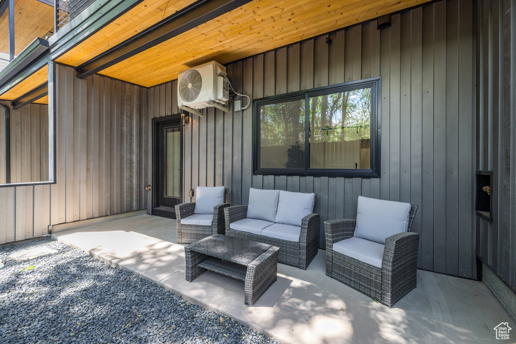 View of patio / terrace with a cooling unit and an outdoor hangout area
