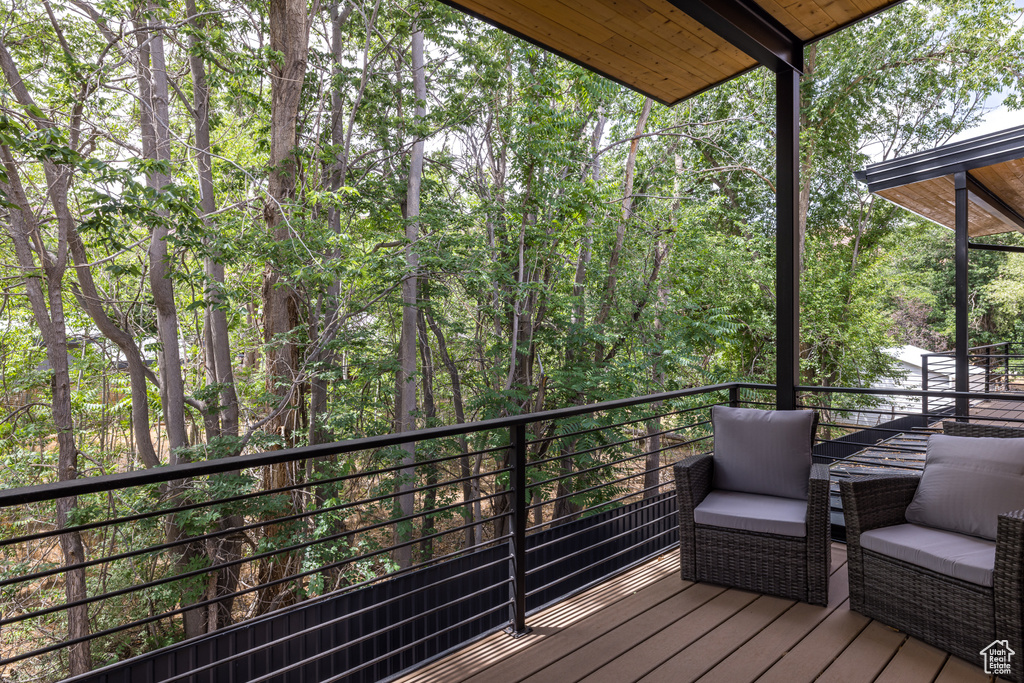 Deck with a wooded view