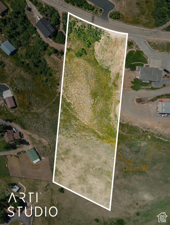 Aerial overview of property's location featuring property parcel outlined