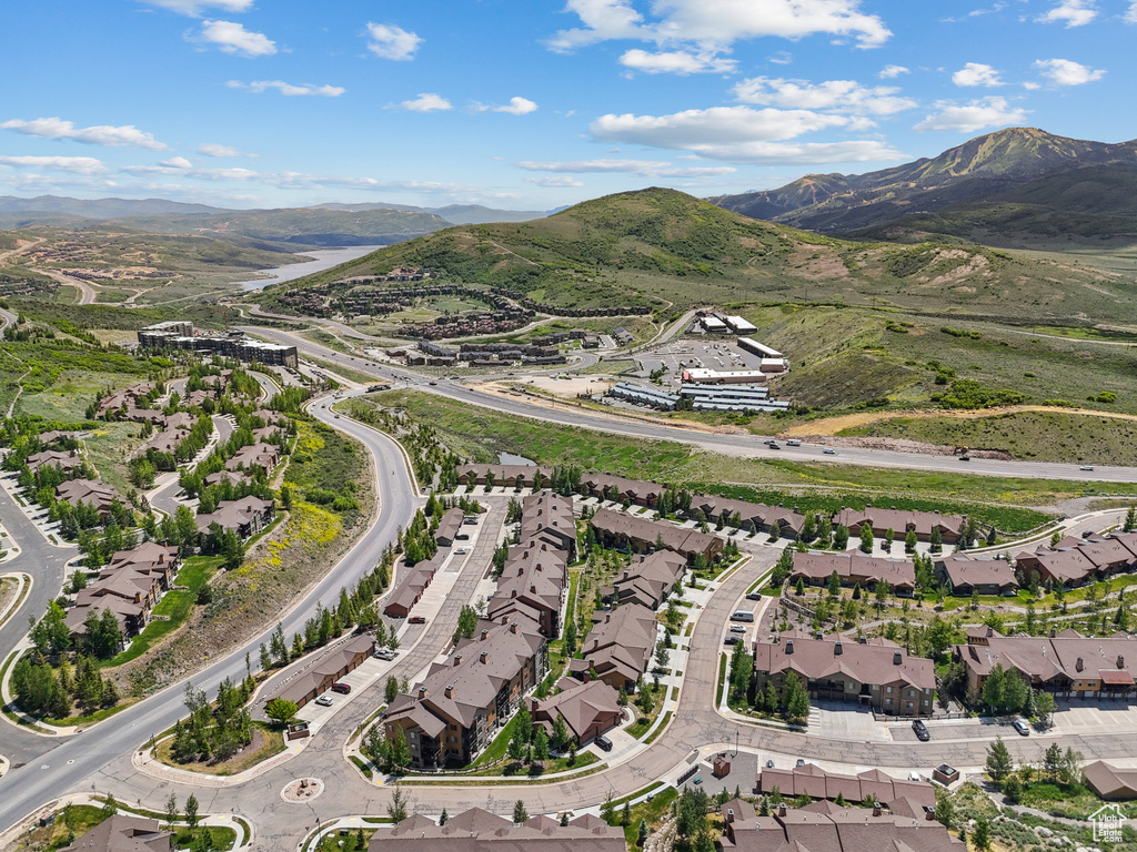 Aerial view of property\'s location with mountains and nearby suburban area