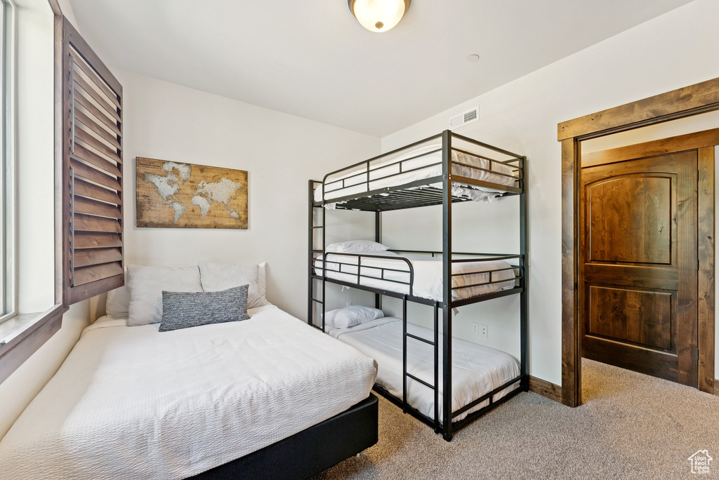 Bedroom featuring carpet
