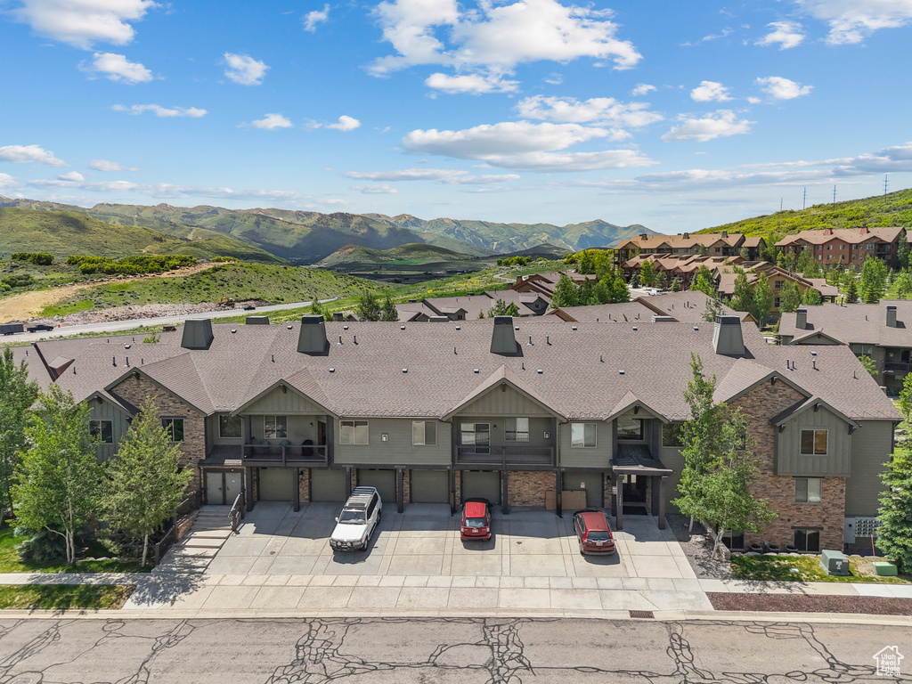 Aerial view of residential area with mountains