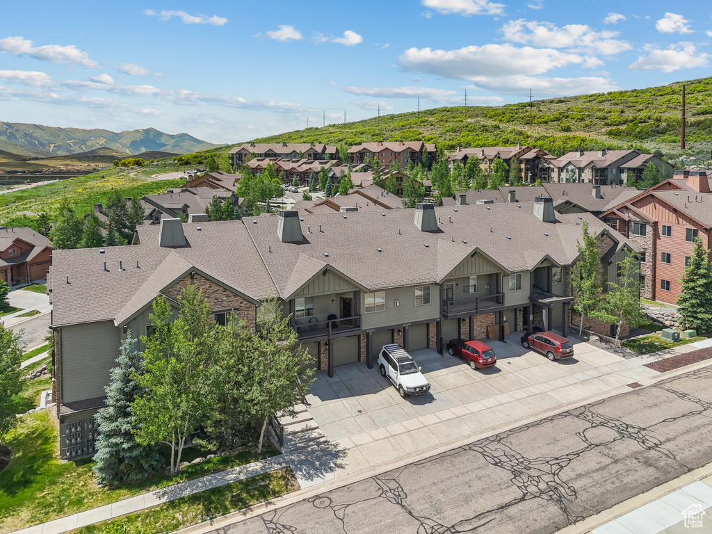 Aerial perspective of suburban area with mountains